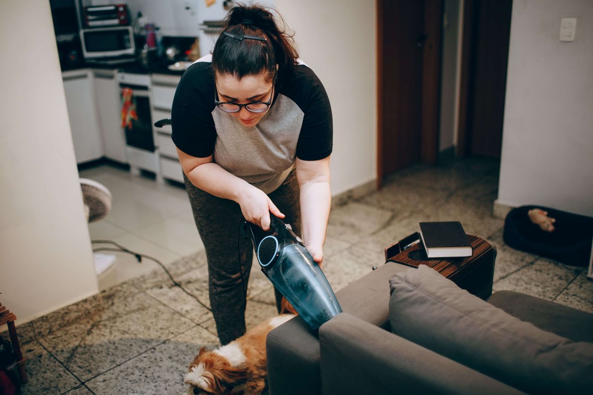 fishers-home-cleaning-vacuuming-pet-hair-on-couch
